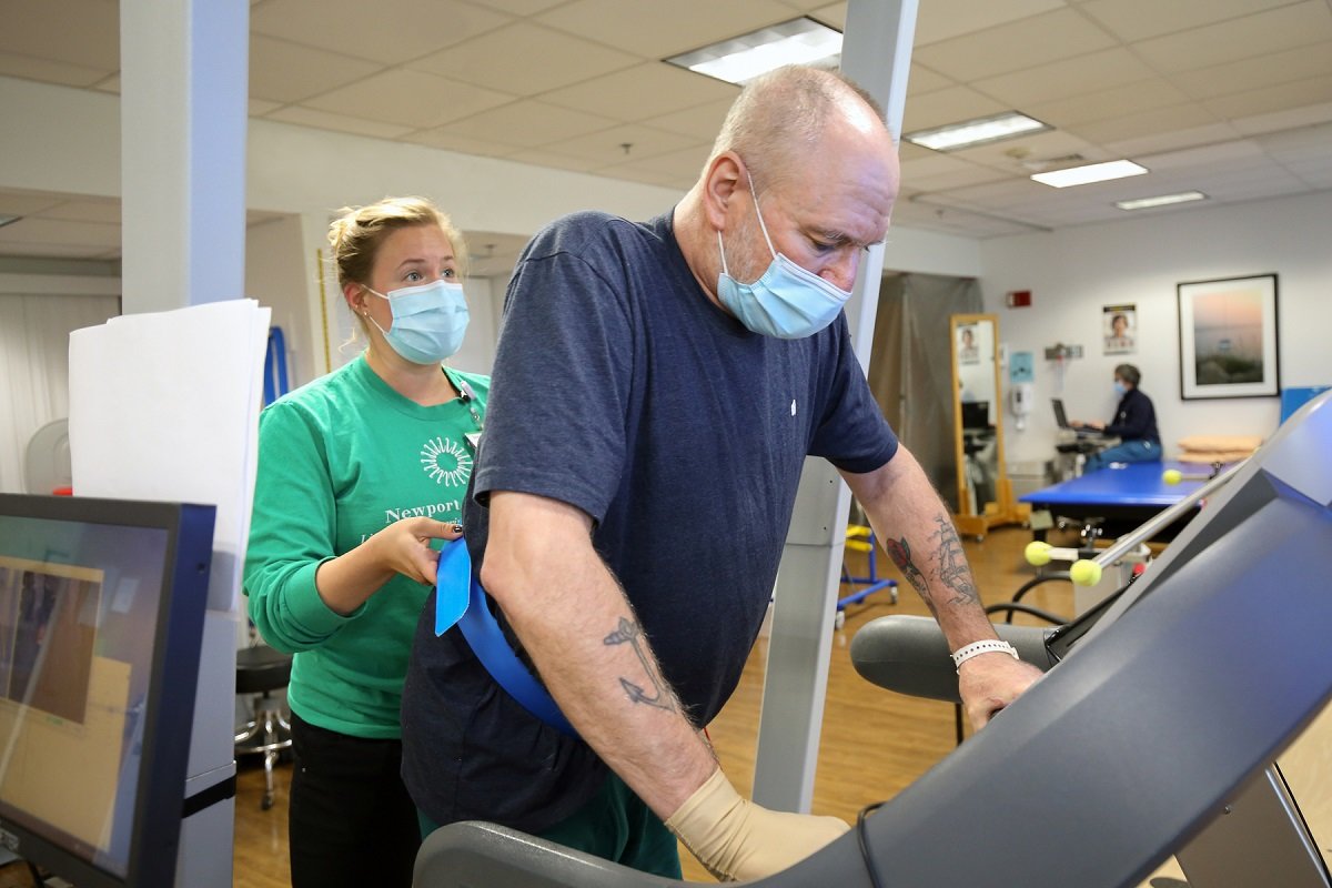 Adult benefiting from exercise equipment at Vanderbilt Rehabilitation Center