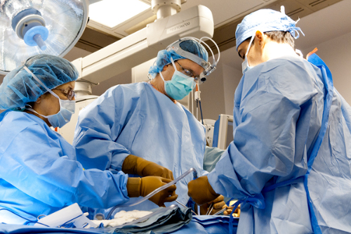 Surgeons performing cardian surgery