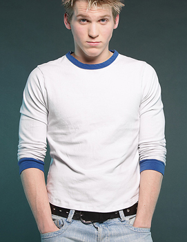 teenager in white shirt and jeans