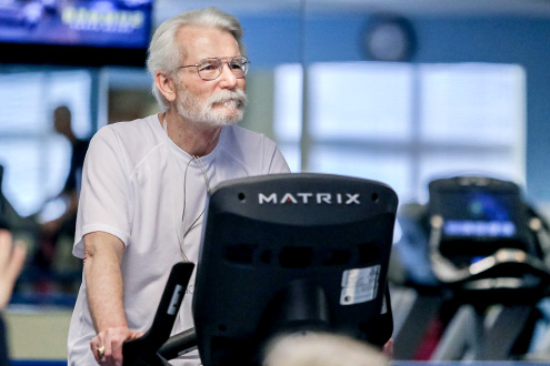 Man on exercise machine 