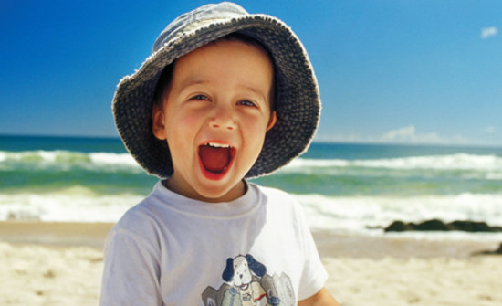 Smiling child at the beach