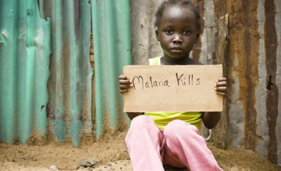 Child holding malaria sign
