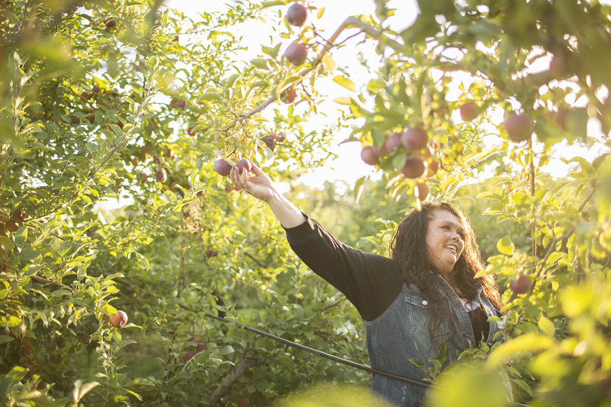 Trina picking apples