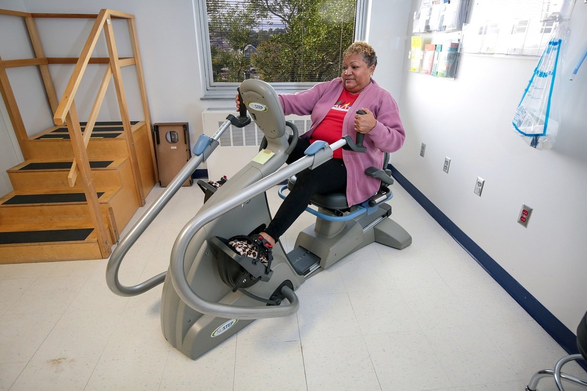 Adult on exercise equipment at Vanderbilt Rehabilitation Center